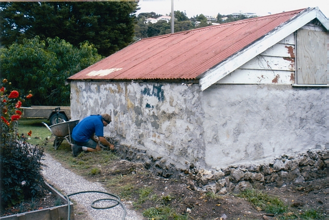 Williams House Paihia - a view from the east side of the stone shed in 2005 showing stonework restoration